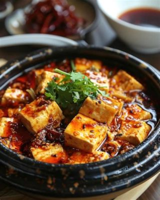  La Delizia Piccante del Tofu Cucinato al Pepe Sichuan: Un'Esplosione di Sapori Acidi e Piccanti che Danzano sul Palato!